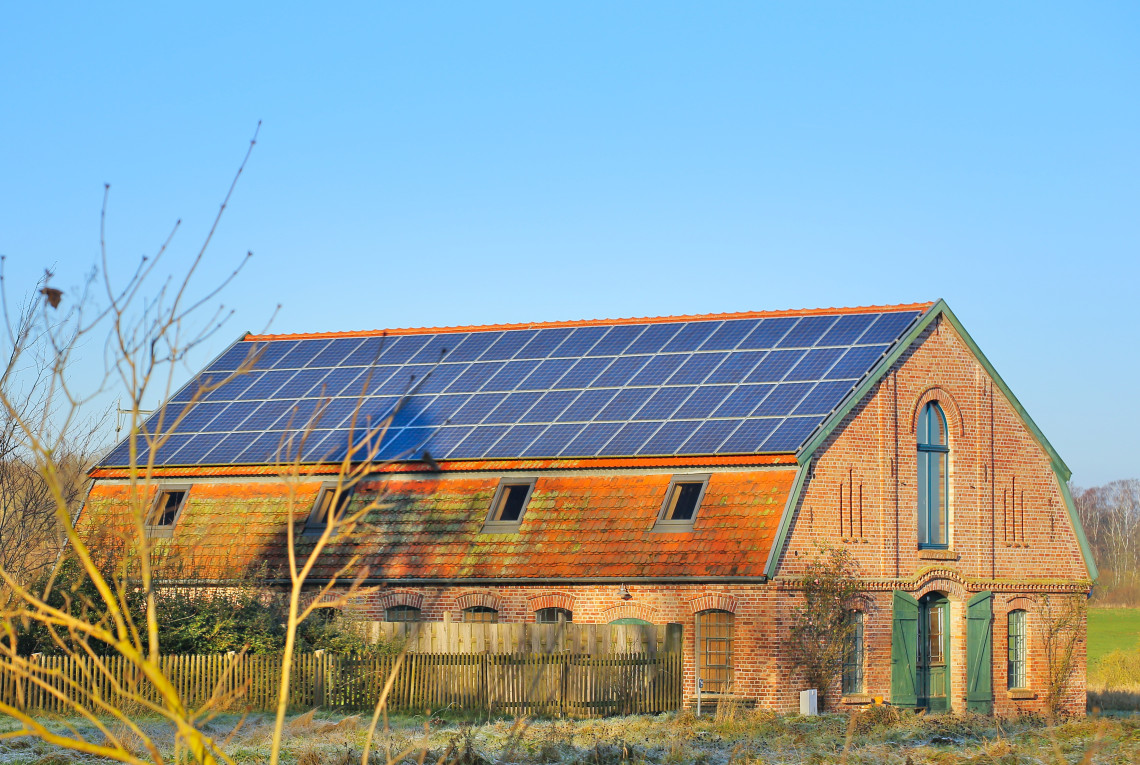 Old farmhouse with solar panels
